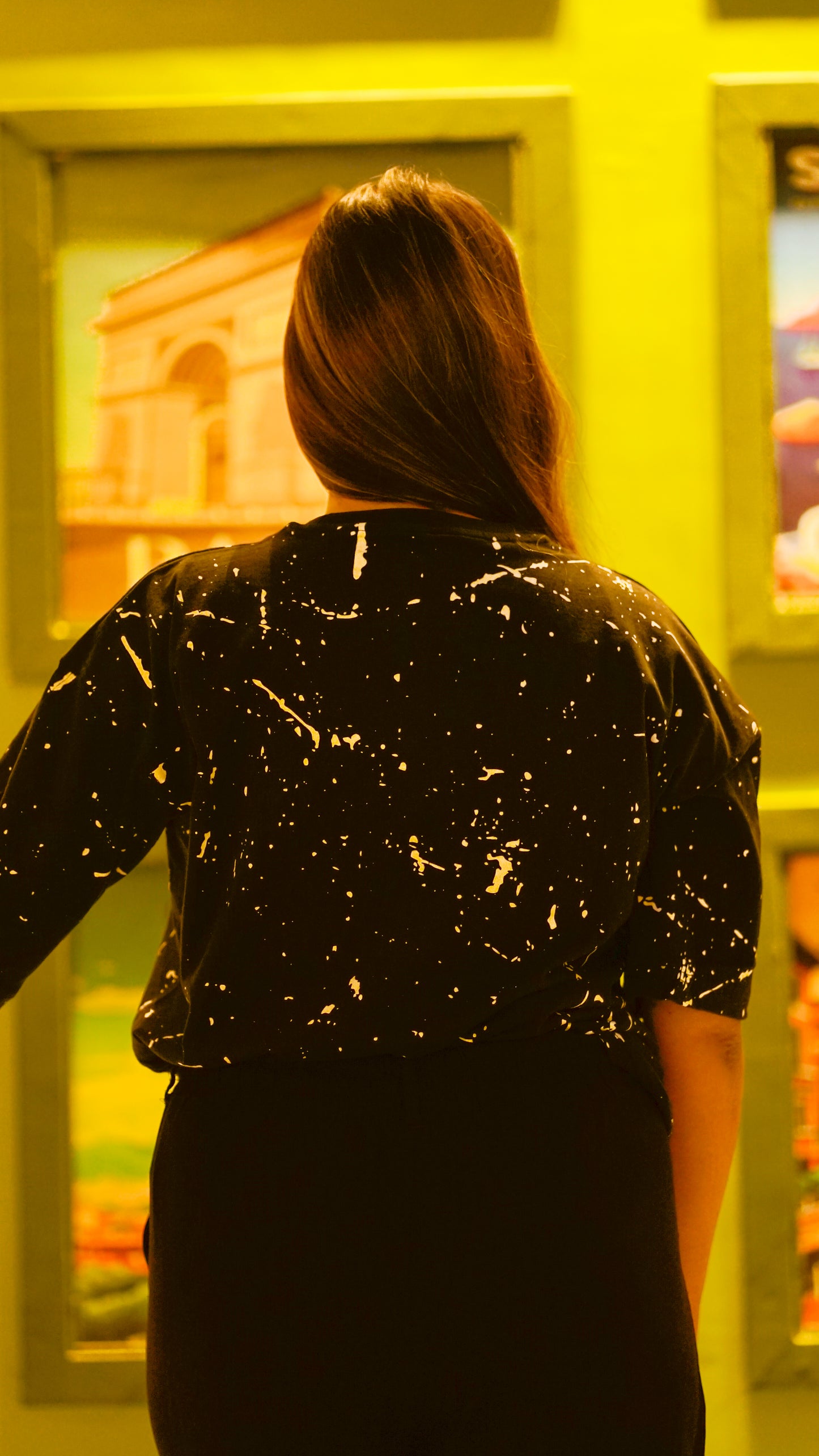 "NEVER STOP" Oversized Streetwear T-Shirt – All-Over Splatter Print (Black)
